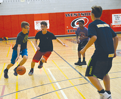 The Orangeville Hawks U14 boys team go through a set of skill challenges during the Club’s final day of the season at Westside Secondary School. The Hawks had their most successful year as a basketball club this year and look on improving next season.