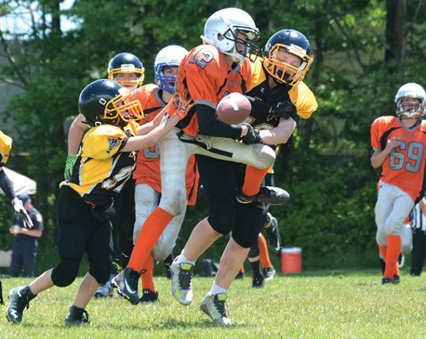 Orangeville Outlaws defender, Gabriel Merkac, knocks down a Clarington Knights pass during Sunday’s (June 25) OPFL Bantam game at Westside Secondary School in Orangeville. The Outlaws blanked the Knights 14-0 to even their record to 3-3 for the season.