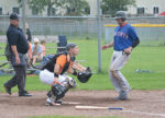 Orangeville Giants catcher, Drew Huerter, looks for the throw as a New Lowell Knights player crosses the plate during the seventh inning of Sunday’s (July 16) NDBL game in Orangeville. It was a low scoring game with New Lowell getting the edge and taking a 3-1 win.