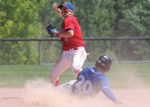 The West Division All-star second baseman Benjamin Davies makes an out against Aaron Giroux of the East Divsion and looks for the throw to first to make a double play during the senior division All-Star game contest July 8, in Midland.
