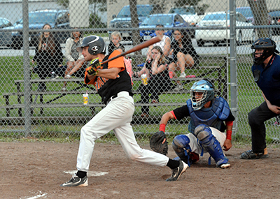 Orangeville’s Matt Drury connects with a swing during Saturday’s (July 22) NDBL game between the Giants and the Nobleton Cornhuskers on the diamond at the Tottenham Community Centre. The Giants walked away with the game taking an 18-4 win.