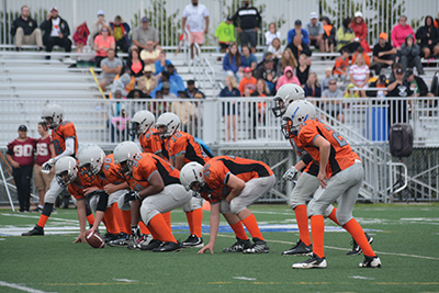 The Orangeville Outlaws Bantam offence line gets ready during Monday’s (Aug. 7) OPFL championship game against the Guelph Gryphons at Kiwanis Field in St. Catharines. The Outlaws battled through the final game to win 25-23 and claim the 2017 Bantam title.